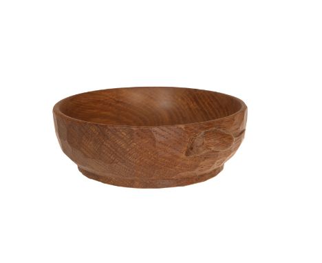 ROBERT THOMPSON OF KILBURNA MOUSEMAN OAK NUT BOWL, circular with adzed exterior and carved mouse signature. 16cm