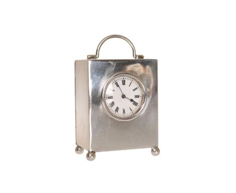 A GEORGE V SILVER CASED CLOCK, Birmingham 1911, with loop handle, above a white dial with Roman numerals, French movement, on