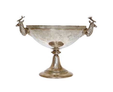 A TIFFANY STERLING SILVER PEDESTAL BOWL, with stag's head handles and beaded knop. 31.49oz, 23cm high