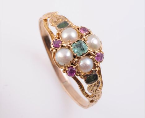 A GEORGIAN EMERALD, SPINEL AND PEARL RING, the square cut emerald highlight set raised to the centre of a scalloped edge moun