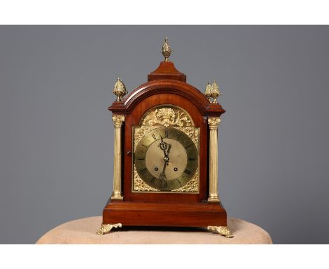A LATE 19TH CENTURY MAHOGANY CHIMING BRACKET CLOCK, with gilt metal Corinthian columns and acorn finials, the dial with Roman