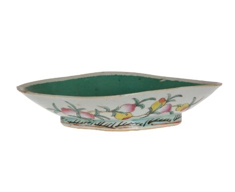 A CHINESE ENAMEL BOWL, probably 18th or 19th Century, of shaped oval form, enamel painted to the exterior with foliage. 26cm 