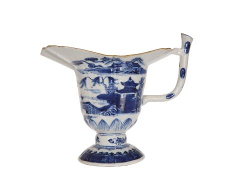 A CHINESE BLUE AND WHITE SILVER SHAPED JUG, 18TH CENTURY, of helmet shape. 13cm