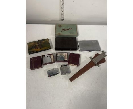 A Collection of Mid-20th Century Smoking Accessories Including an Ascot Florentine Dagger Lighter and Ronson Lighters 