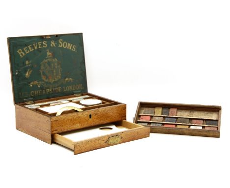 A Reeves & Sons artists box, the mahogany box containing a selection of watercolour blocks, trays etc and the drawer opening 