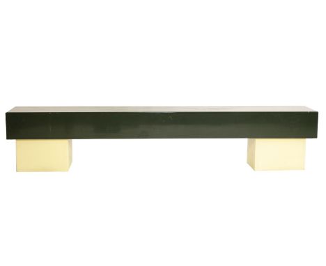 A green lacquer and cream bench, the rectangular seat on block supports, 231cm wide x 36cm deep x 63cm high