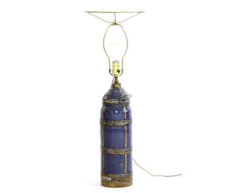 A Marrakesh blue glazed pottery table lamp of cylindrical form with metal mounts