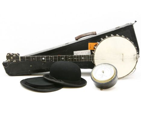 A banjo, cased, two hats (bowler and top), and a barometer