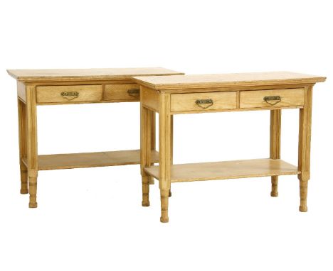 Two late 19th century light oak side tables, each with two drawers and lower shelf, one stamped maples, 91cm wide x 45cm deep