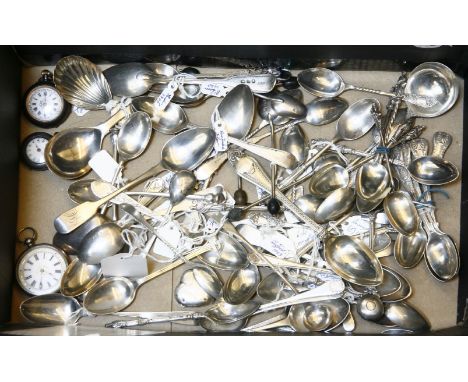 A collection of Georgian and later silver spoons, including two Georgian caddy spoons, and three pocket watches