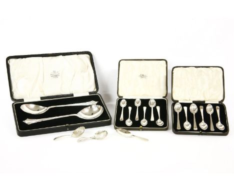 A cased pair of silver serving spoons, Rowell & Son Ltd, 1889, together with two cased sets of silver teaspoons, and three fu