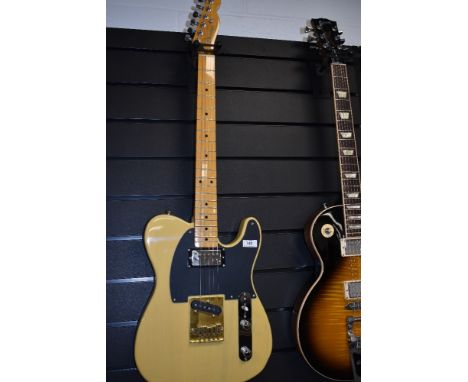 A Fender Telecaster (possible 'partscaster') Japanese neck and fitted yellow tweed case