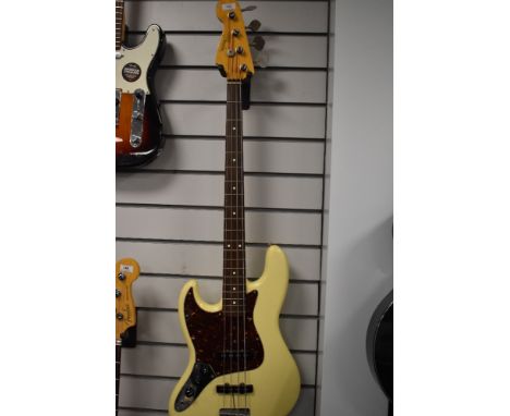 A Fender Jazz bass guitar, made in JapanSERIAL NUMBER E727032Left handed