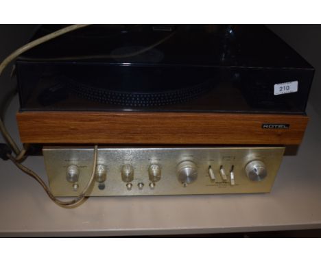 A vintage Rotel turntable and amplifier