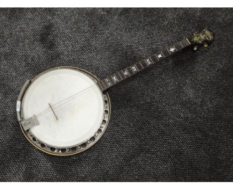 A Paramount style C 4 strings banjo by WCL Lange, inlaid head, labelled and stamped internally, body and tension post both st