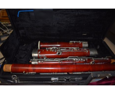 A Buffet Crampon  Oboe, a gear for music bassoon and a traditional silvered flute THE BUFFET SERIAL No 18458- FLUTE SERIAL No