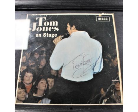 A rare framed and signed copy of the Tom Jones and the Squires EP - sleeve is a little tatty but this is a real rare item for