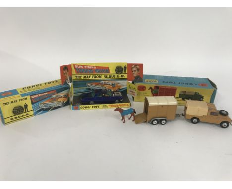A Boxed Corgi Man From U.N.C.L.E Thrush-Buster #497 (No Ring) and a Gift Set 2 Land Rover With Rices Pony Trailer And Pony.(w