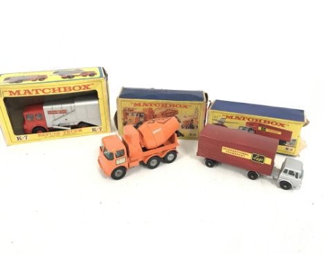 A Boxed Matchbox Refuse Truck #K-7. A Ready Mix Concrete Truck #K-19. And an Articulated Freight Truck #M-2. Boxes are Worn.
