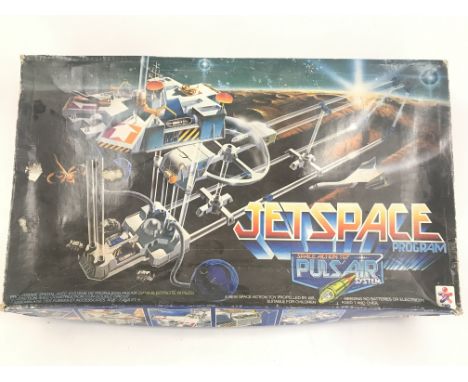 A Boxed Cejl Jetspace Program set and a Airfix Ford Tractor Set.