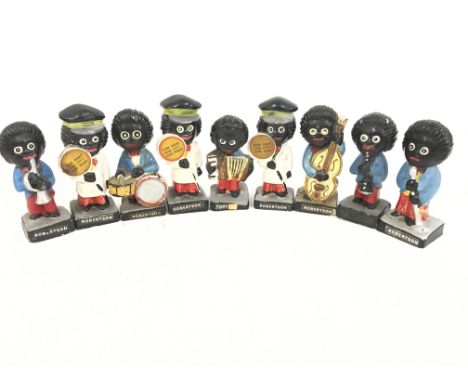 A Collection of 9 Robertson Figures. Notice from the the-saleroom.com: These items are listed on the basis they are illustrat
