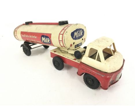 A Tinplate Wells Brimtoy Milk Tanker. friction Powered.