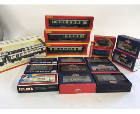 A range of 00 gauge model railway carriages and wagons..manufactured by Hornby..Bachmann..Lima and Dapol.