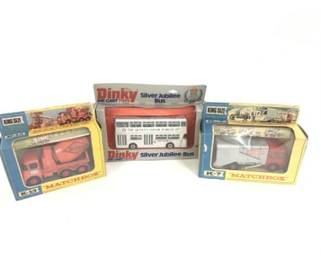 2 Boxed Matchbox vehicles. A Ready-mix Concrete Truck #K-13. A Refuse Truck #K-7 and a Dinky Silver Jubilee Bus.