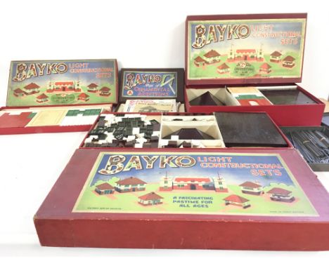 A group of vintage 4 Bayko construction and accessories sets plus a tin with building rods.