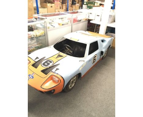 This miniature Replica Ford GT40, 1968 winning car, built by Frenchman Francis Mortarini, founder of Automobiles S.C.A.F., in