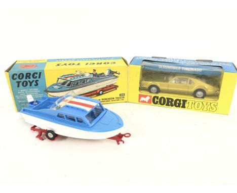 A Boxed Corgi Dolphin 20 Cruiser On Wincheon Trailer #104 and a Oldsmobile Toronado #276.