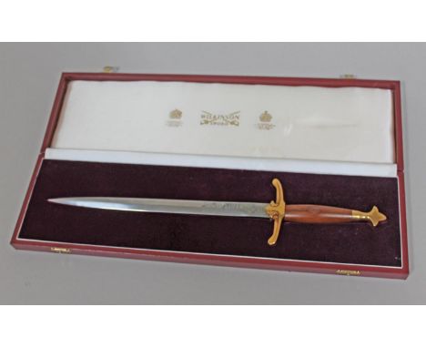 A cased Wilkinson Sword presentation dagger, the blade lacking any personal inscriptions.  Condition - minor wear only.