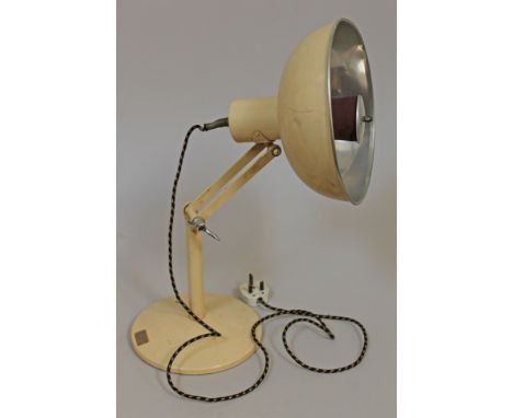 A Radiaray adjustable enamel heat lamp.  