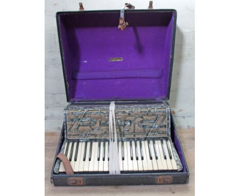 A Carmen piano accordion.  