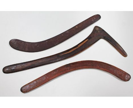 A group of three Aboriginal boomerangs including a swan neck hunting throwing stick.  
