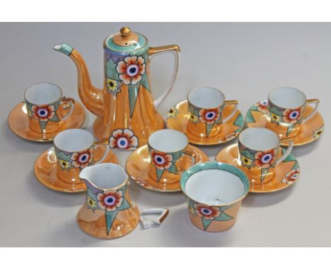 An Art Deco Noritake porcelain coffee set.  Condition - cream jug with broken handle otherwise ok no further damage, general 