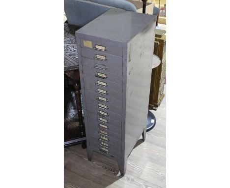 A set of metal file drawers and contents comprising watch spares/repairs and tools, keys etc.  