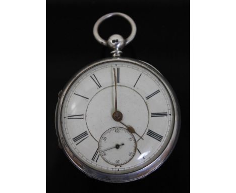 A hallmarked silver pocket watch with enamel dial and roman numerals, seconds subsidiary dial and key wound movement.  Condit