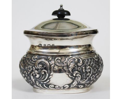 A hallmarked silver reposse sucrier, height 11cm, wt. 6oz.  