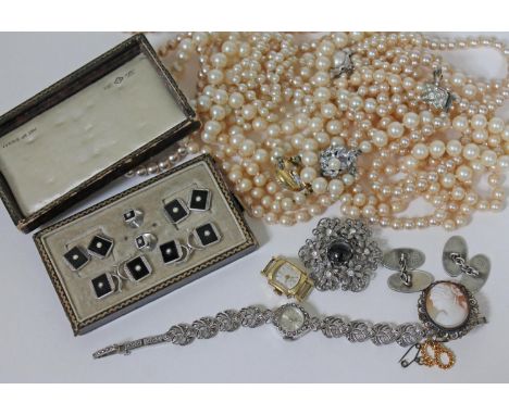 A quantity of costume jewellery to include a set gents Art Deco silver button and cufflink set,a pair of silver cufflinks, tw