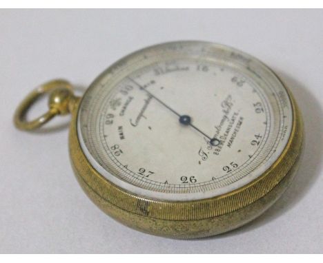 A Victorian brass pocket barometer the dial inscribed 'Compensated' and 'F Armstrong & Bro... ....Deansgate Manchester', diam
