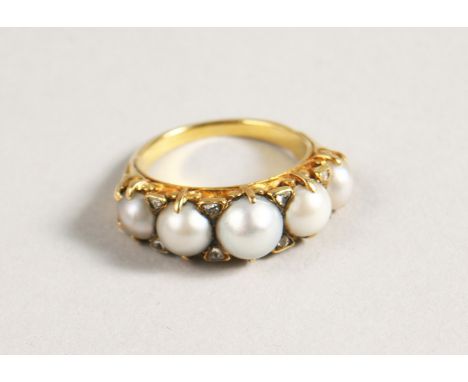 AN 18CT GOLD FIVE-STONE PEARL AND DIAMOND RING.