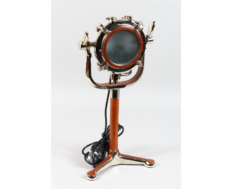 AN ALUMINIUM AND LEATHER TABLE LAMP. 20ins high.