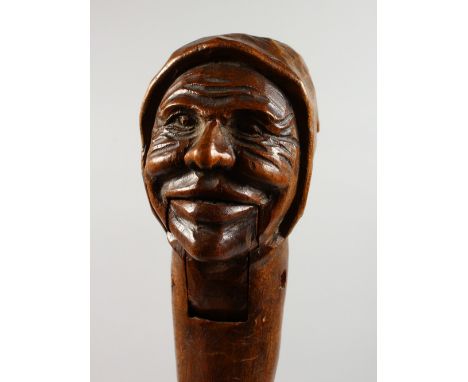 A GOOD HAND CARVED WOOD WOMAN NUTCRACKER. Brienz 1900.  8.5ins long.