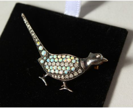 A SILVER AND GOLD, OPAL AND DIAMOND PHEASANT BROOCH.