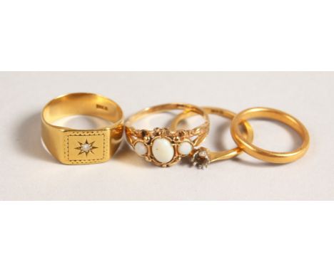 AN 18CT GOLD AND DIAMOND SIGNET RING, 22CT GOLD WEDDING BAND and TWO OTHER RINGS.