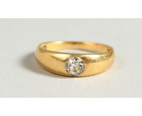 A SMALL 18CT GOLD AND DIAMOND RING.