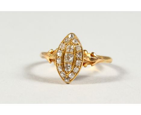 AN 18CT GOLD, DIAMOND AND MARQUISE RING.