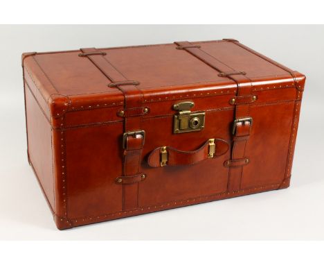 A LEATHER TRUNK. 24ins wide.