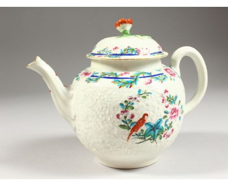 A VERY RARE 18TH CENTURY WORCESTER TEAPOT AND COVER, chrysanthemum moulded enamelled with a parrot standing in a floral wreat